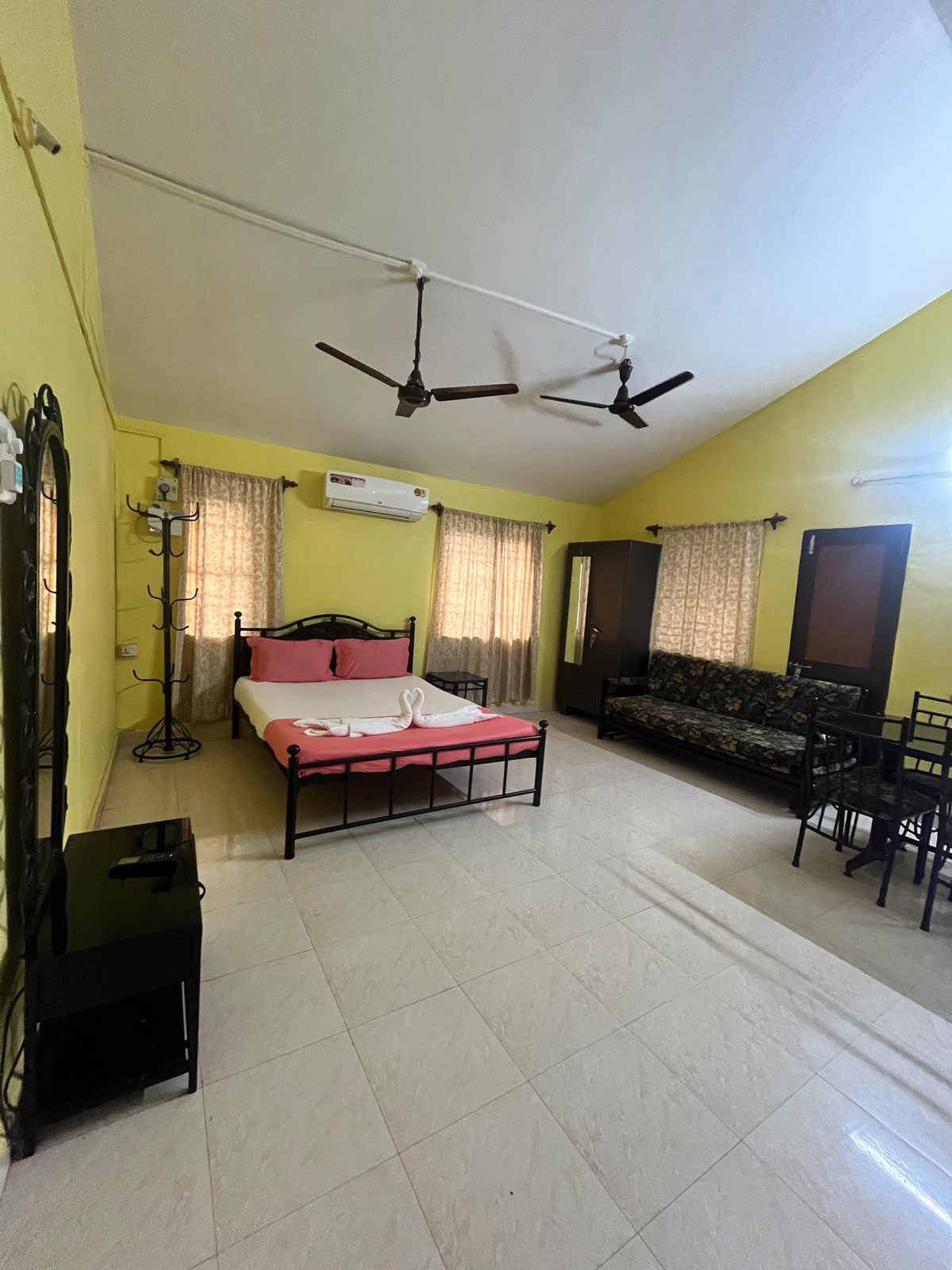 Family Room living space and bed